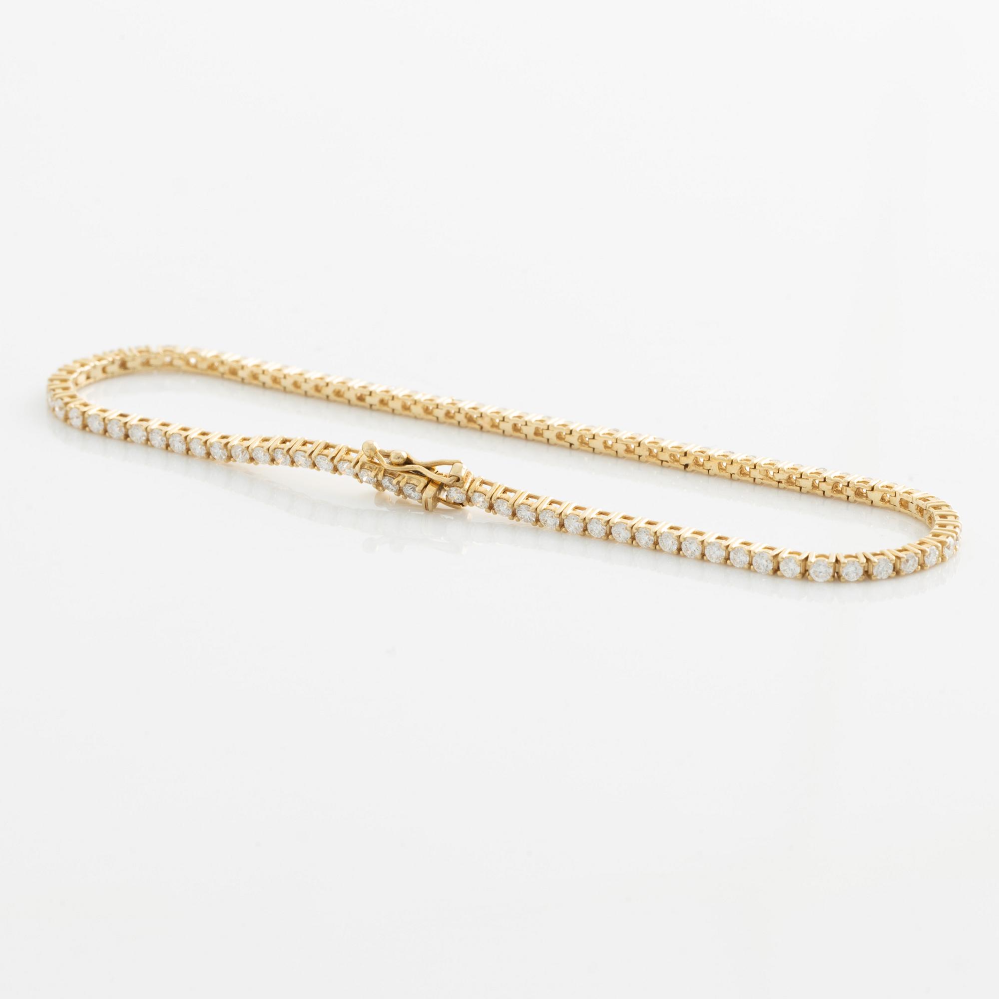 Tennis bracelet, 14K gold with brilliant-cut diamonds.