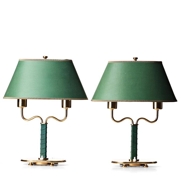 Josef Frank, a pair of brass and green leather table lamps, Svenskt Tenn, model 2388.