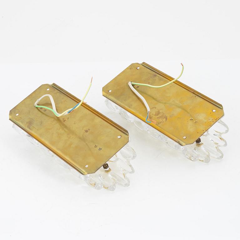 Carl Fagerlund, a pair of brass and glass wall lights, ÖIA, second half of the 20th Century.