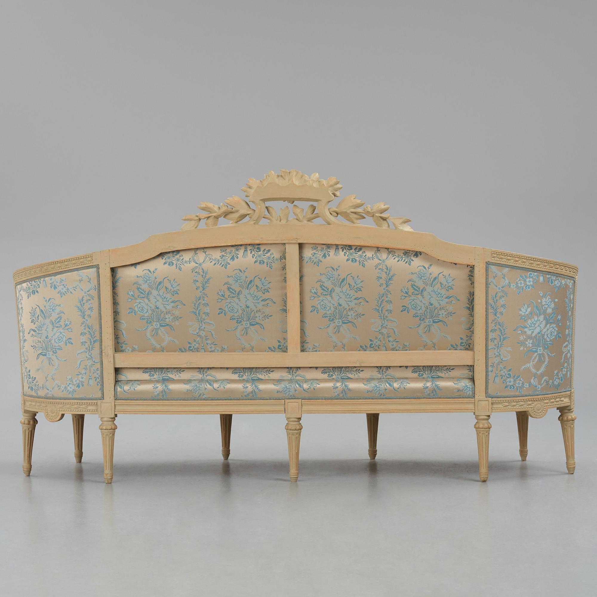 A grey-painted Gustavian 'canapé en corbeille'. sofa, later part of the 18th century.