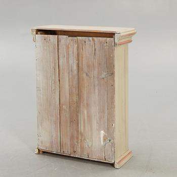 An 18th century painted cabinet.