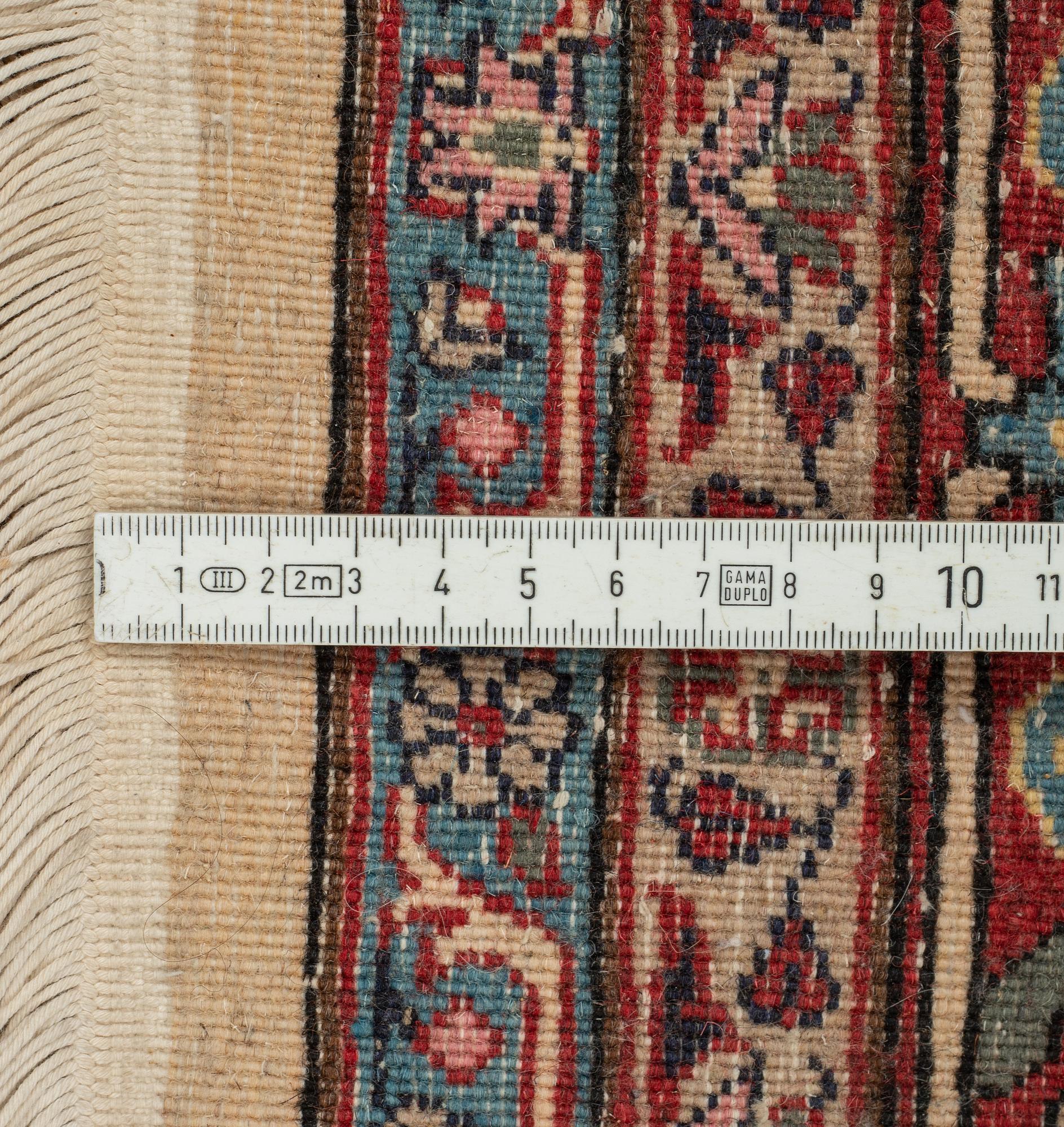 A carpet, oriental, ca 197 x 124 cm.