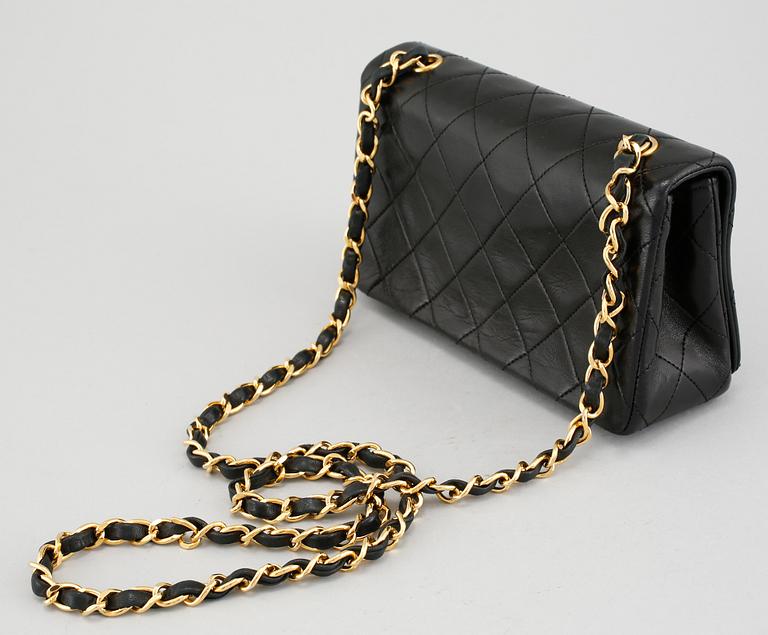 A 'Mini Flap' Chanel lamb skin handbag.