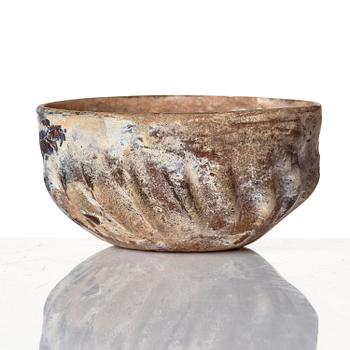 A mould-blown glass bowl, probably Iran, circa 12-13th century.