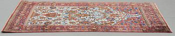 A RUG, a semi-antique silk Kashan, ca 201,5 x 122-130 cm.