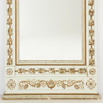 An Empire mirror, first half of the 19th century.