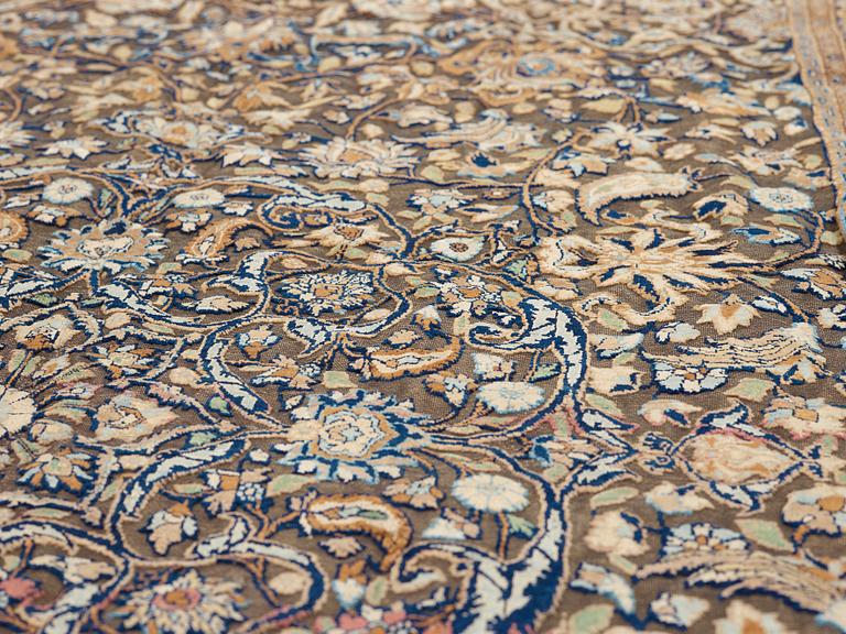 A RUG. A semi-antique silk Kashan Souf (in relief). 210 x 131,5 cm (as well as one cm flat weave at each end).