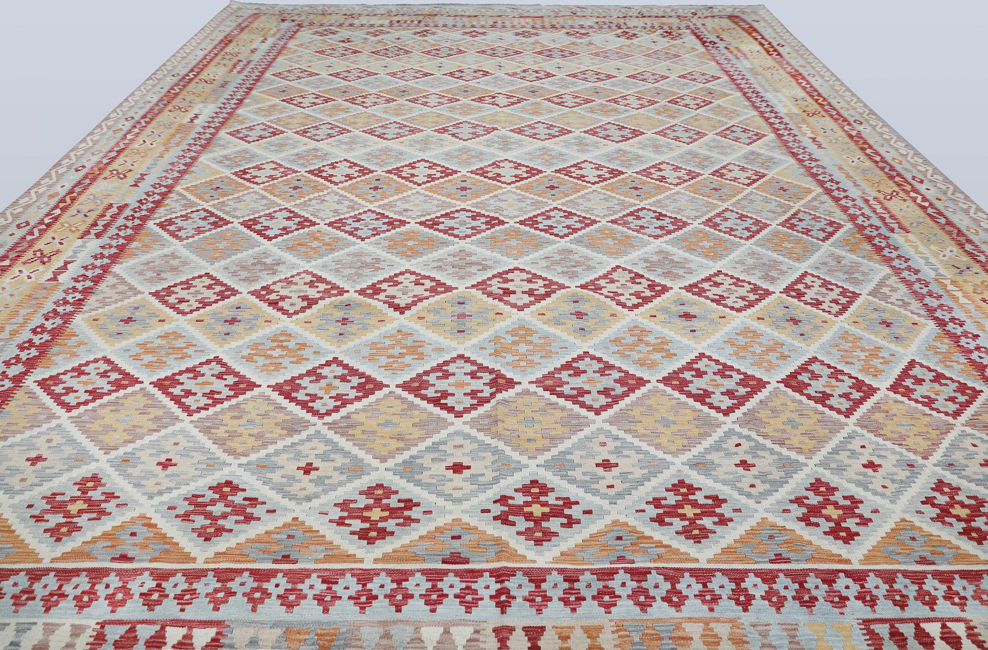 A Kilim carpet, approx. 591 x 401 cm.