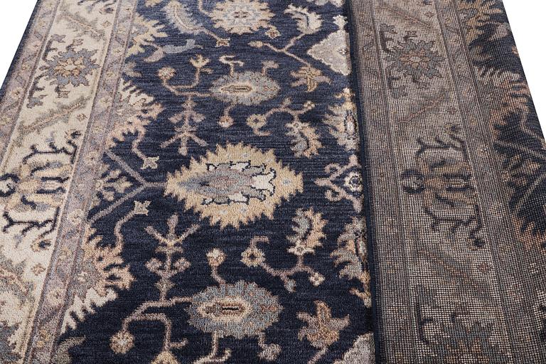 A Mamluk design carpet, c. 305 x 245 cm.