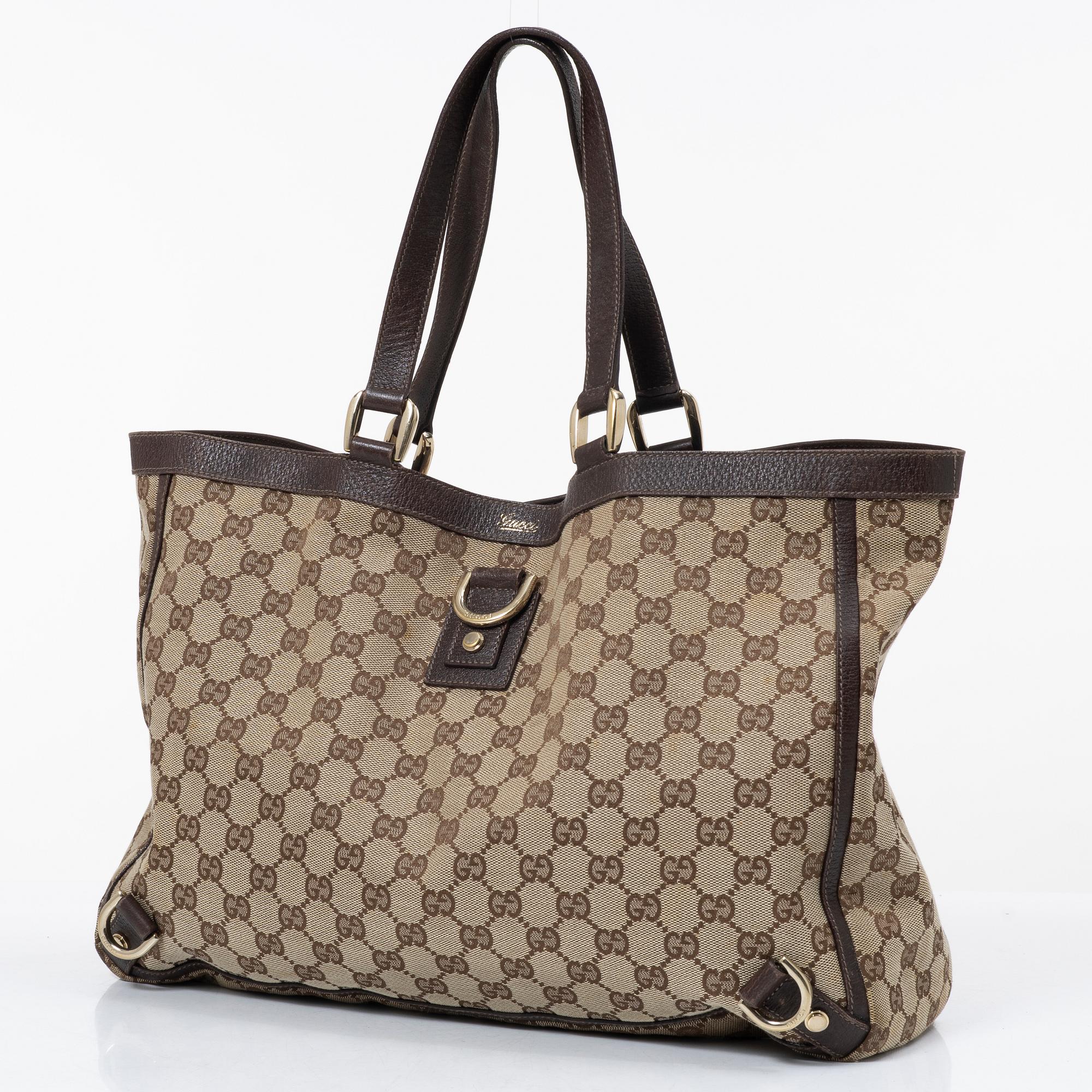 Gucci, a canvas and leather bag.