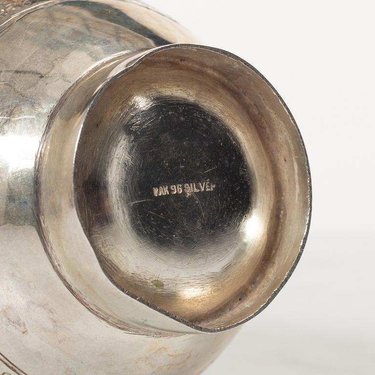 A pair of jugs, silver, Pakistan, mid-20th century.