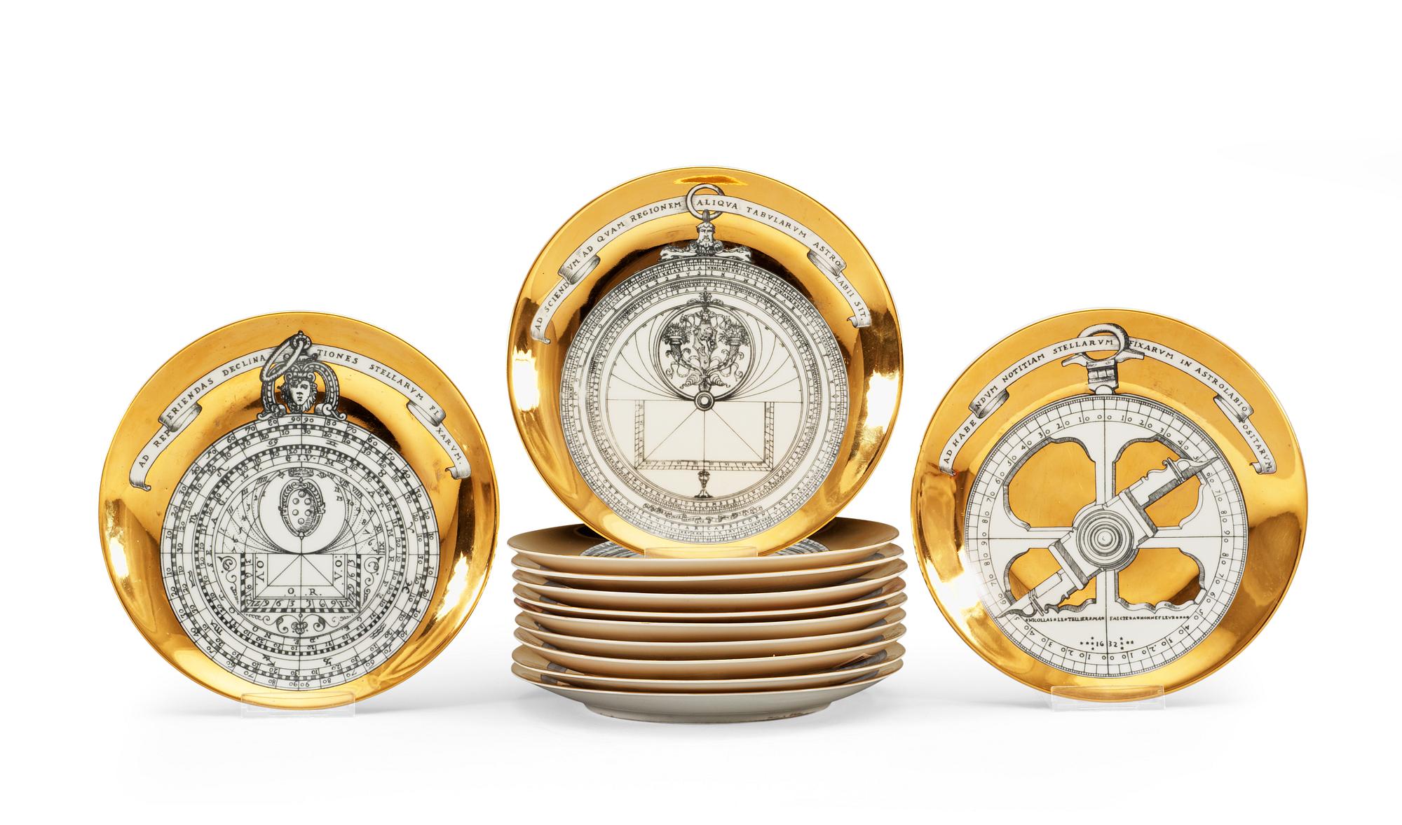 A set of twelve Piero Fornasetti 'Astro labio' porcelain plates, Milan, Italy.