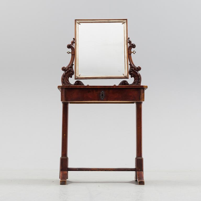 A mid 19th century late empire dressing table.