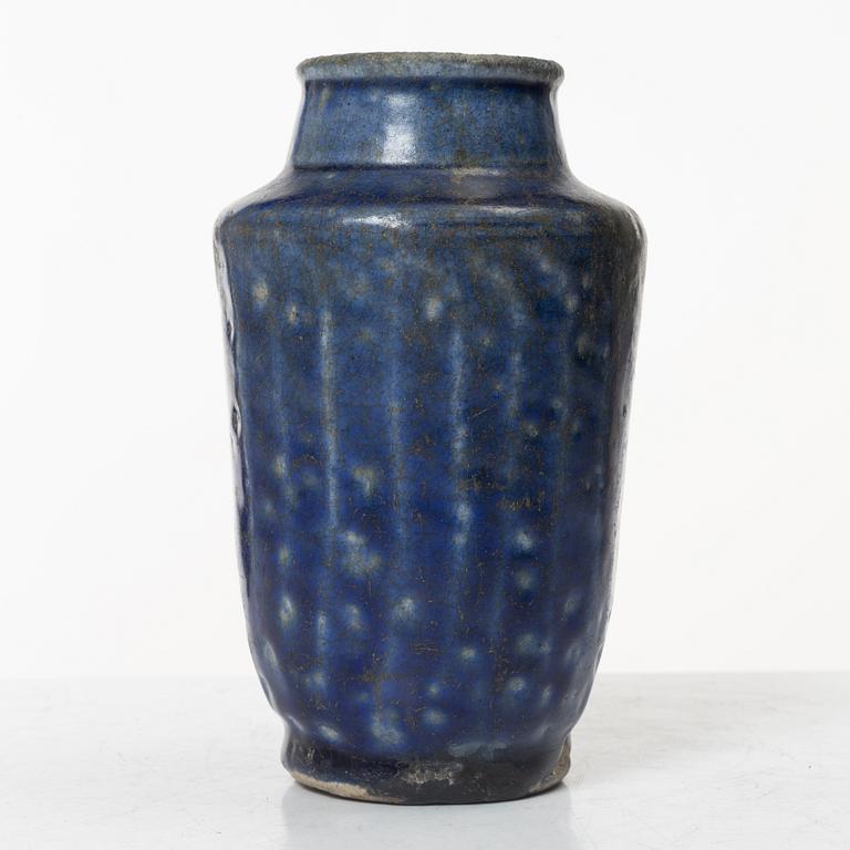 A Kashan pottery vase, central Persia 13th century.