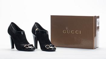 SKOR, Gucci.