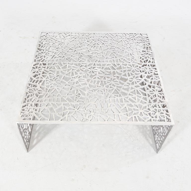 A 21st century aluminium coffee table.