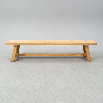 A contemporary oak table and two benches from Garbo Interiors.