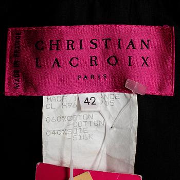 CHRISTIAN LACROIX, a black cocktail dress.