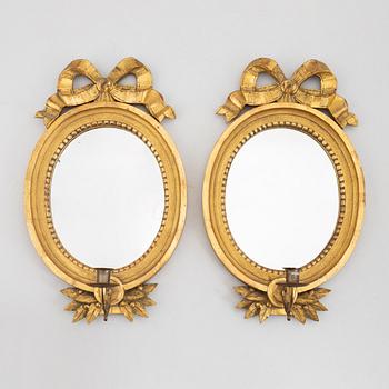 A pair of Gustavian style mirror sconces, beginning of the 20th century.
