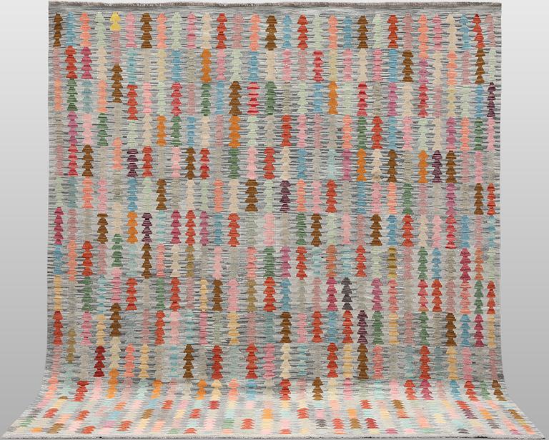 A Kilim rug, approx. 294 x 252 cm.