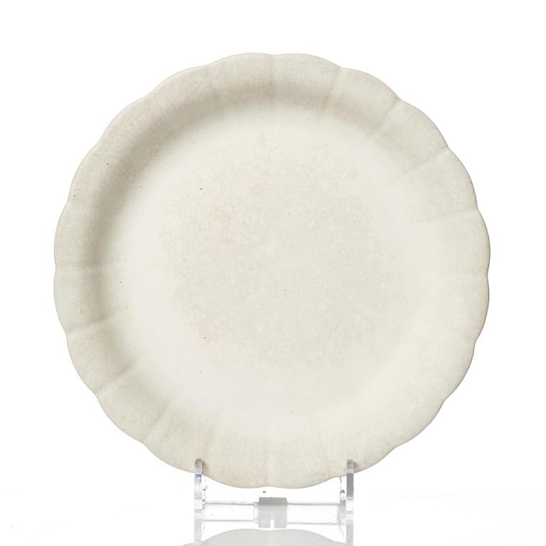 Wilhelm Kåge, 15 pieces of "Carrara" and "Gold Carrara" stoneware dishes, Gustavsberg, Sweden, 1930s/40s.