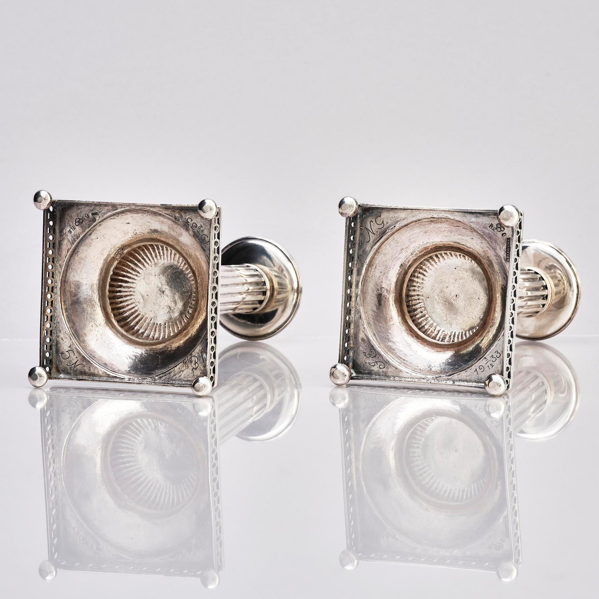A pair of Swedish 18th century Gustavian silver candlesticks, marks of Arvid Floberg, Stockholm 1799.