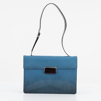 Prada, a blue patent leather bag.