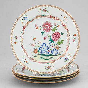 A set of four famille rose dinner plates, Qing dynasty, Qianlong (1736-95).