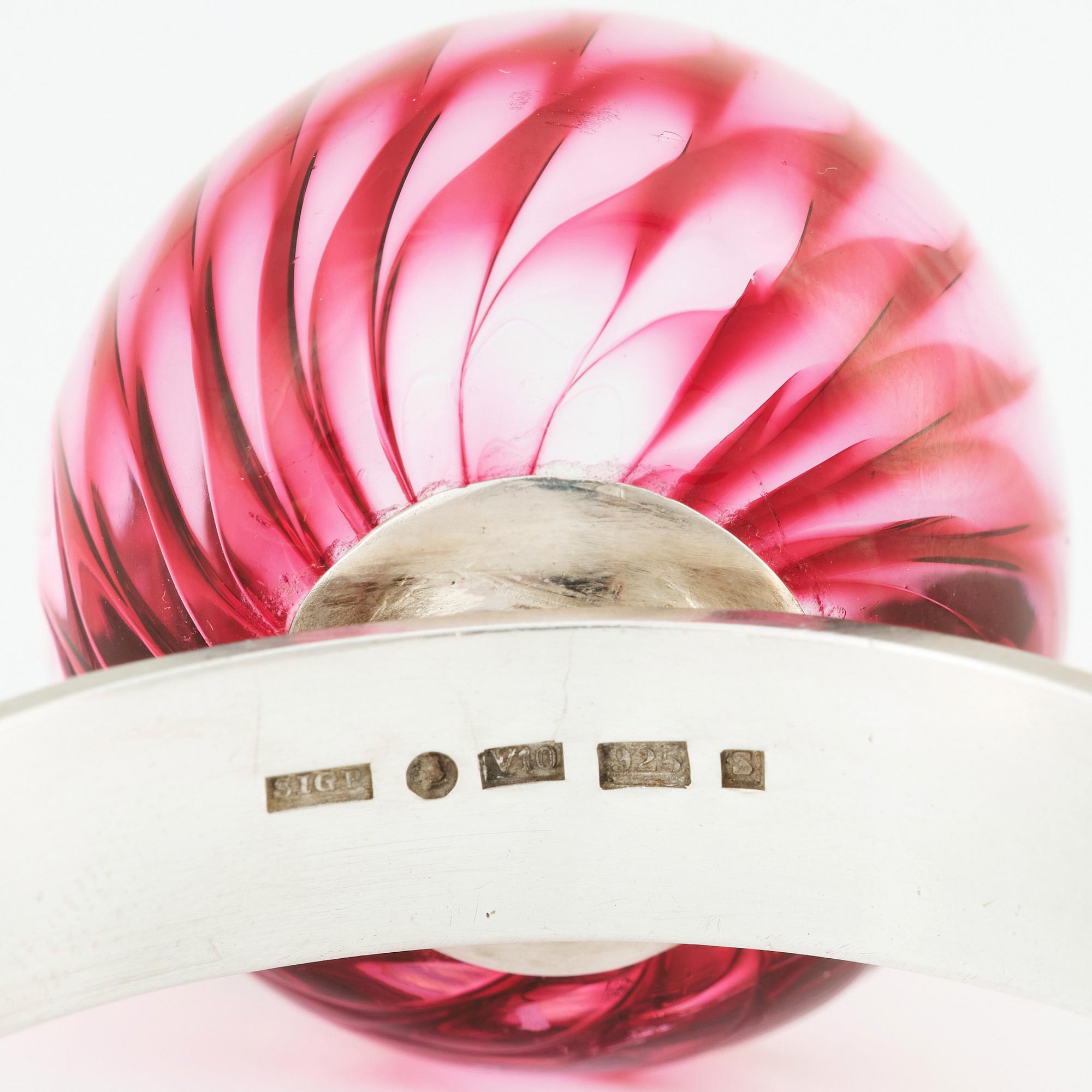 Sigurd Persson, a sterling silver bangle crowned with a strawberry coloured glass ball, Stockholm 1995.