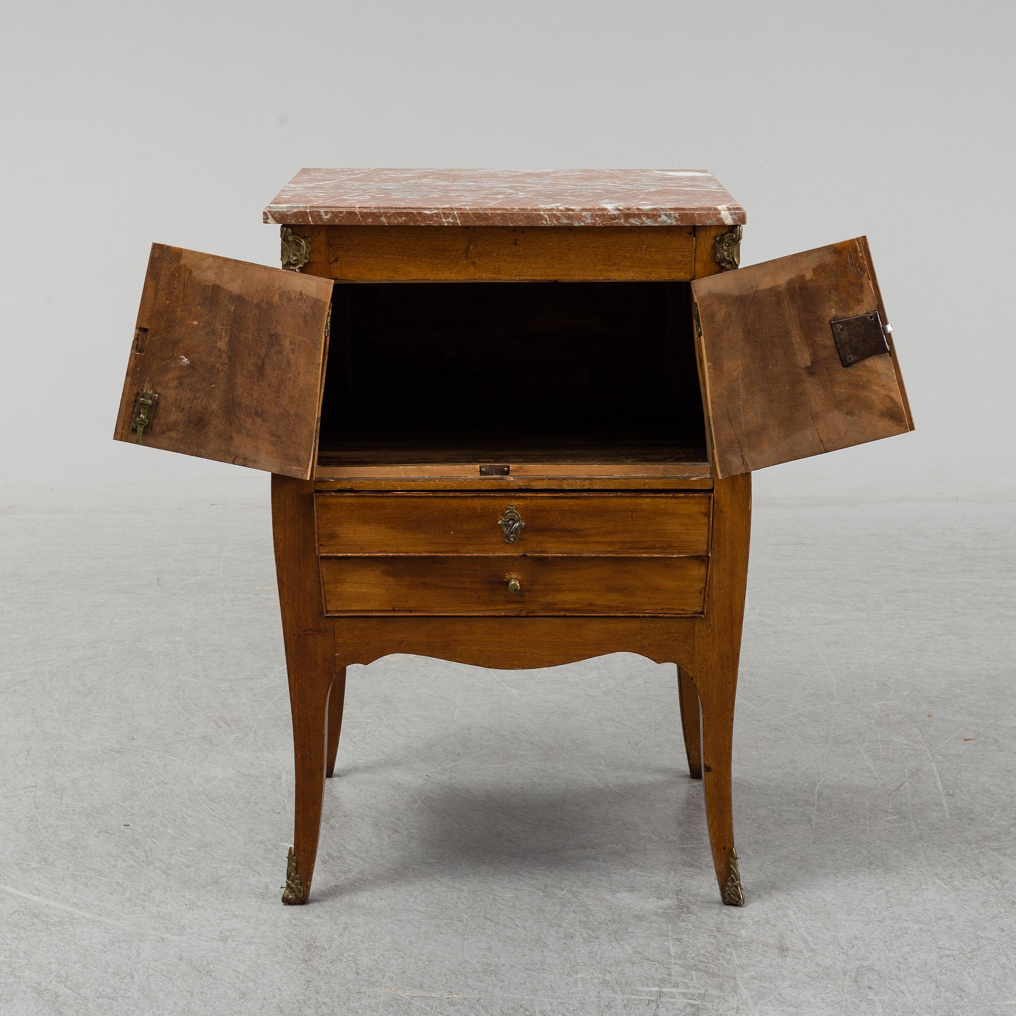 A Rococo cabinet, 18th Century.