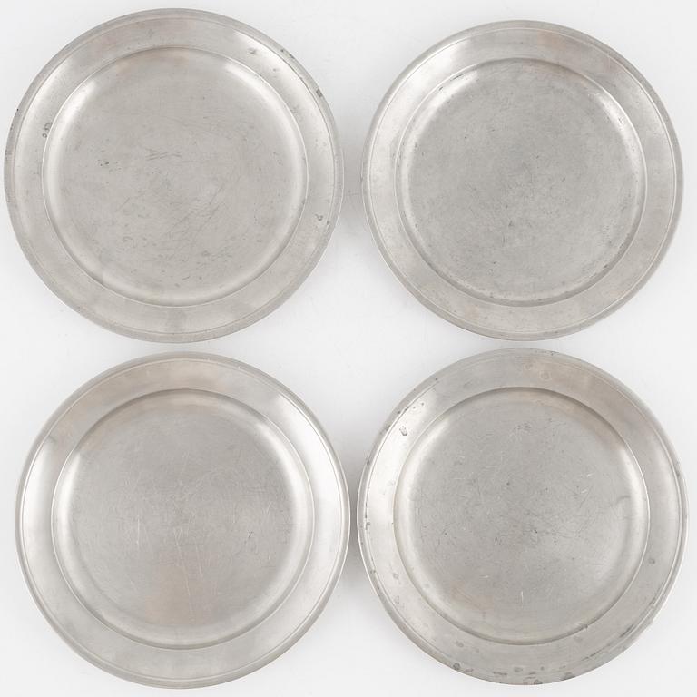 A set of eight pewter side plates, Firma Svenskt Tenn, Stockholm, 1927 and 1944.