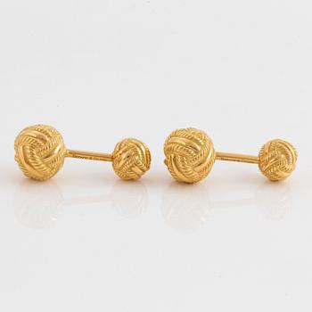 A pair of Tiffany & Co 18K gold cufflinks designed by Schlumberger.