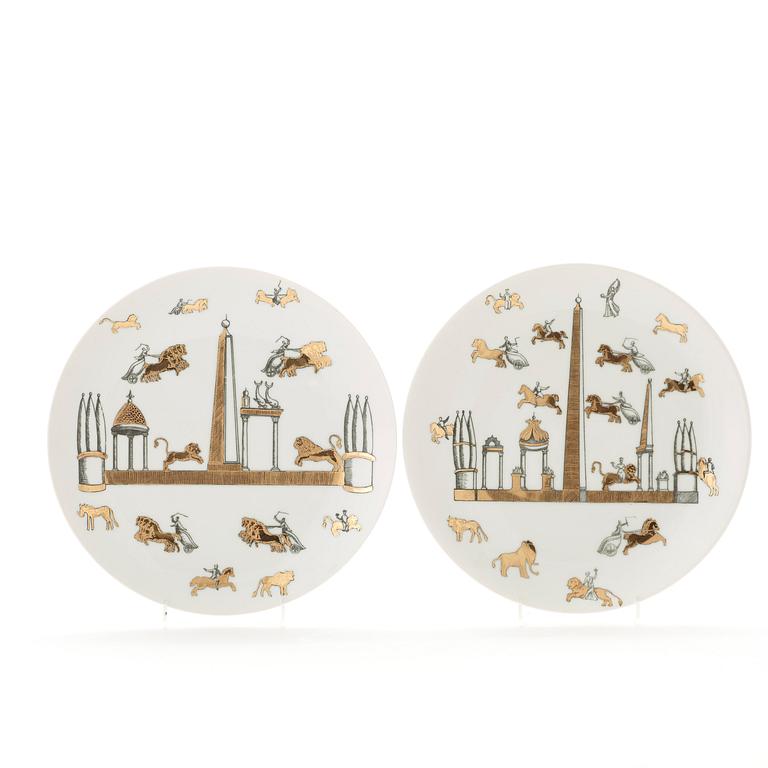 Piero Fornasetti, a set of eleven porcelain plates, Milano, Italy.