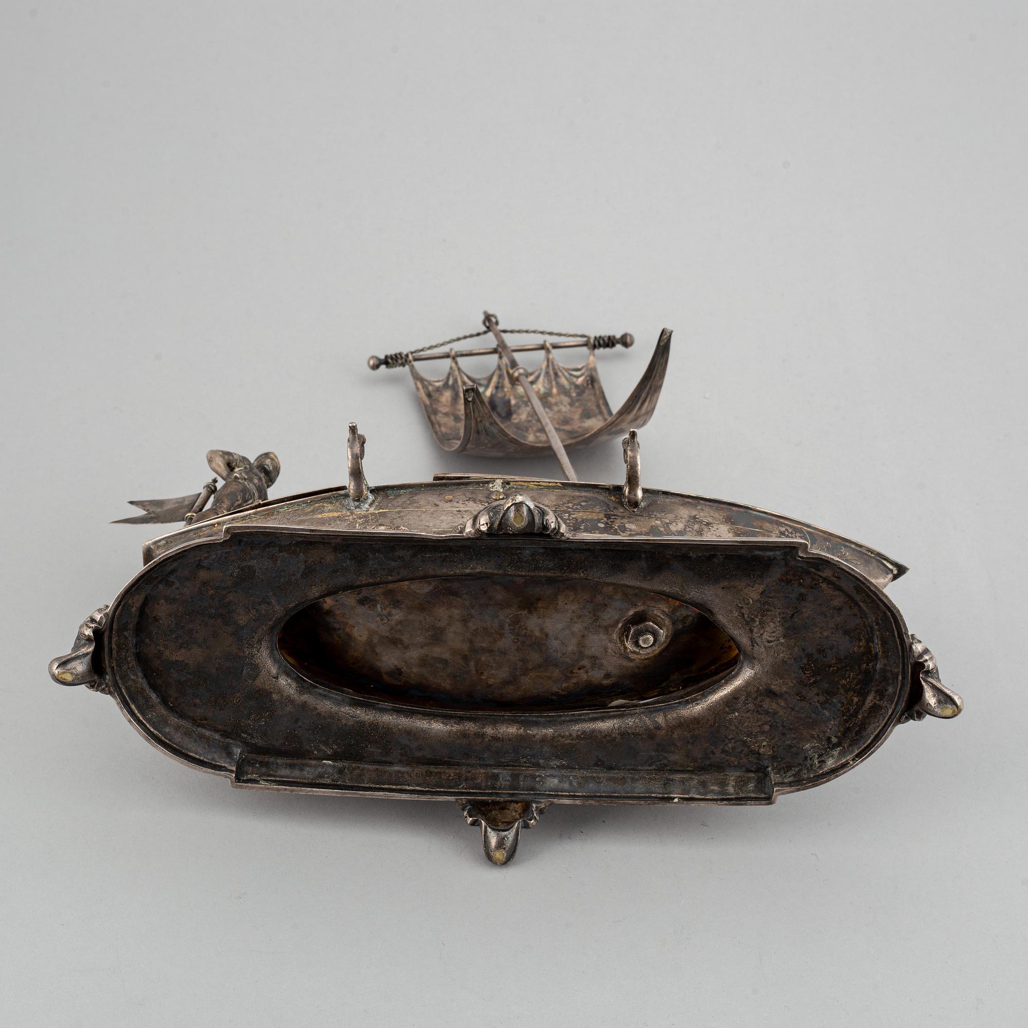 A silver plated inkwell, circa 1900.