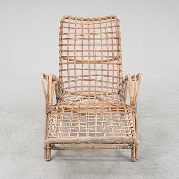 Rattan sun bed/recliner/deck chair, mid 20th Century.