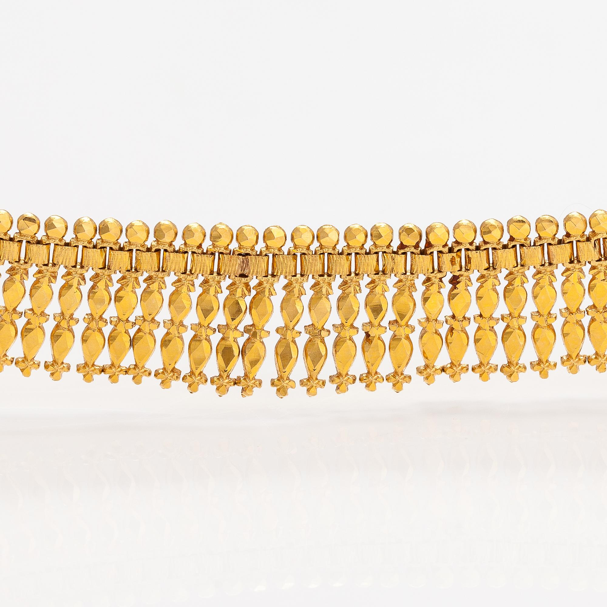 Halsband, armband och örhängen, 14-21K guld.