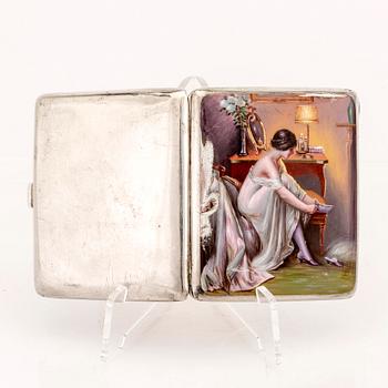 An early 1900s silver and enamel cigarette case, weight 162 grams.