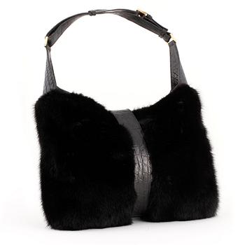 GUCCI, a black fur and crocodile shoulder bag.