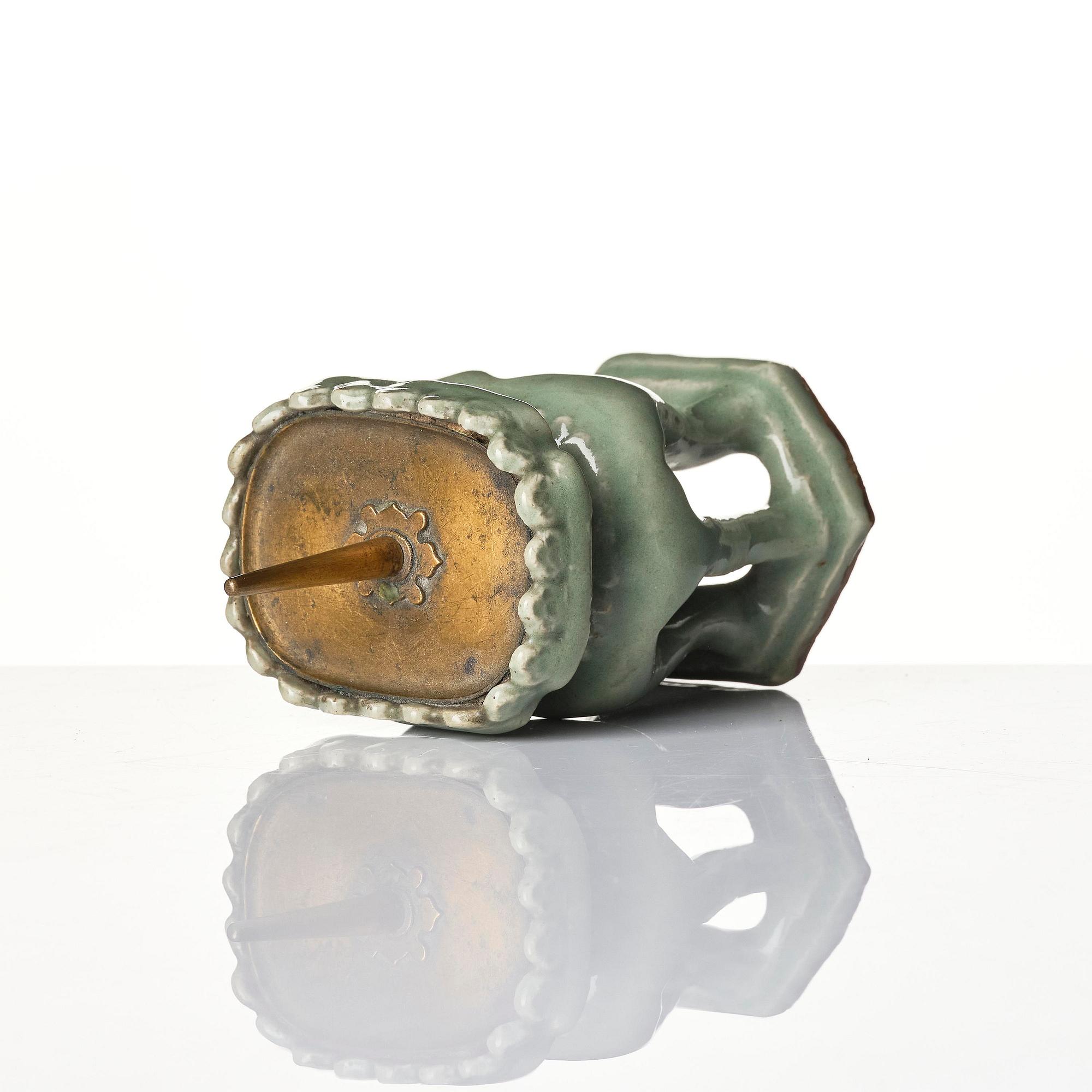 A rare celadon lamp, Ming dynasty (1368-1644).
