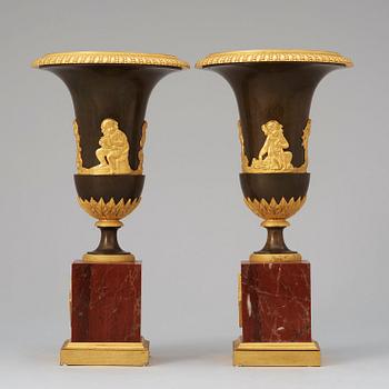 A pair of French Empire early 19th century urns.