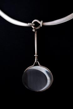 Vivianna Torun Bülow-Hübe. Necklace with pendant, sterling silver and rock crystal or glass.