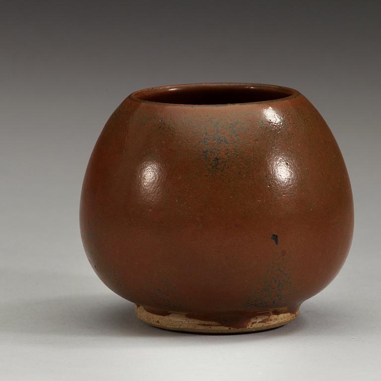 A Henan brown lotus shaped cup, Song dynasty (960-1279).