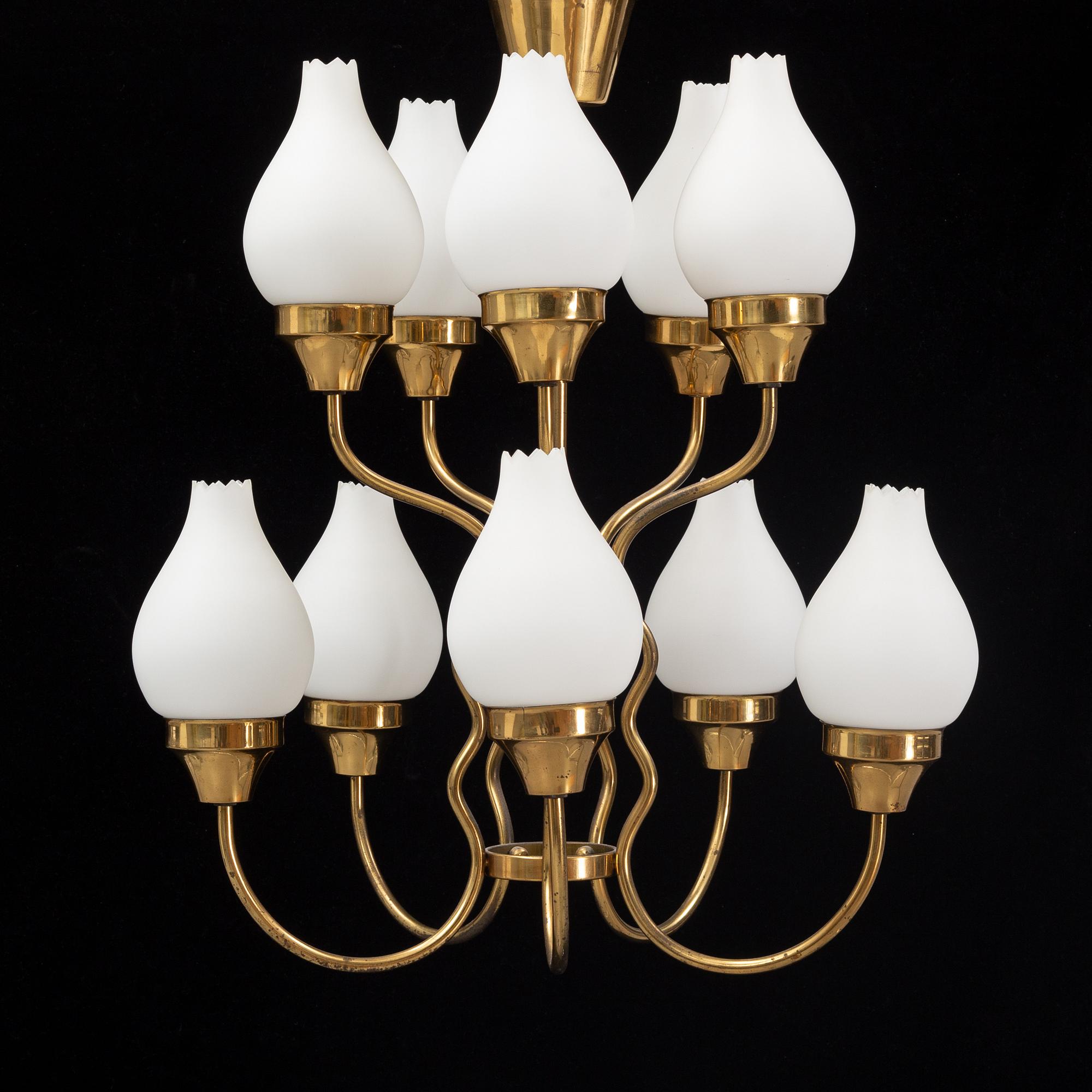 A brass and glass ceiling lamp for ten lights, first half 20th century.