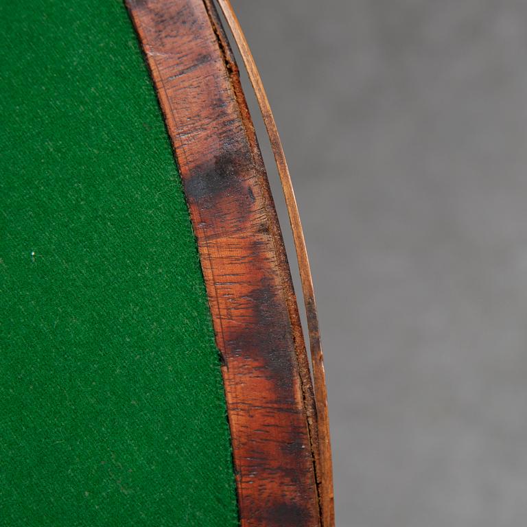 A pair of George III demi-lune mahogany card tables, first half of the 19th Century.