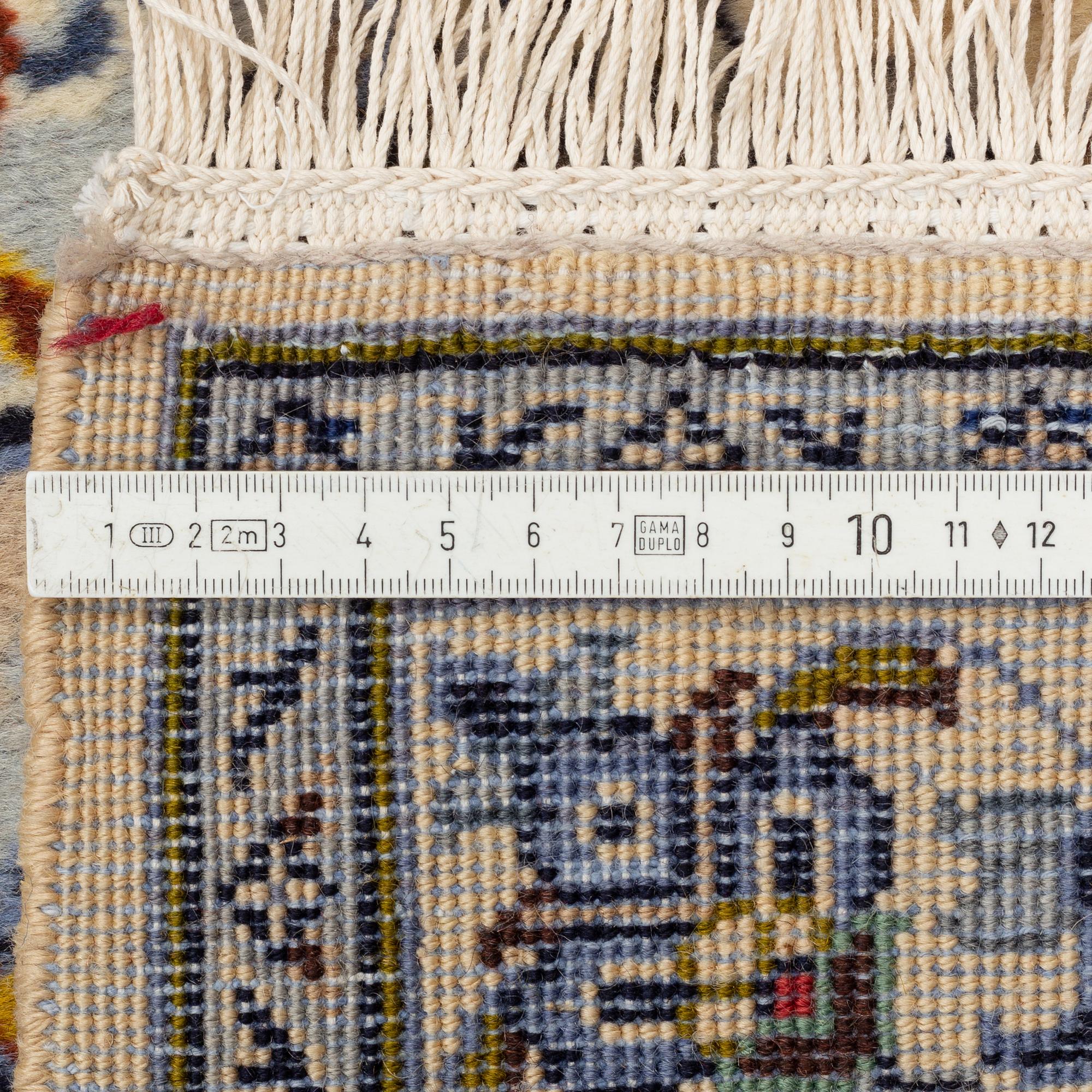A carpet, semi-antique, Kashan, ca 398 x 281 cm.