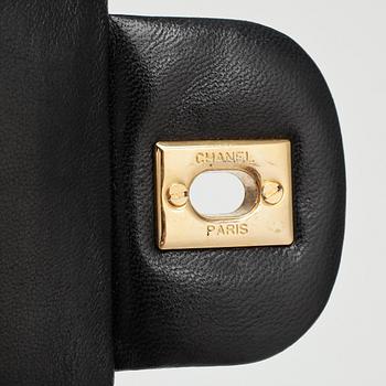 CHANEL, a quilted blue leather "Double Flap" shoulder bag.
