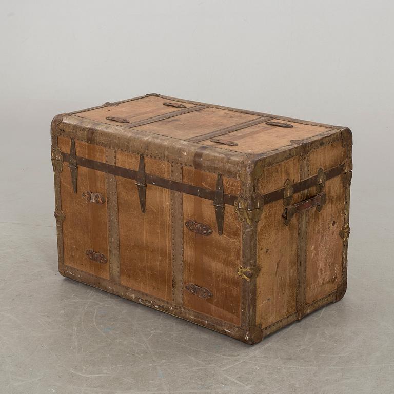 An early 20th century leather trunk.