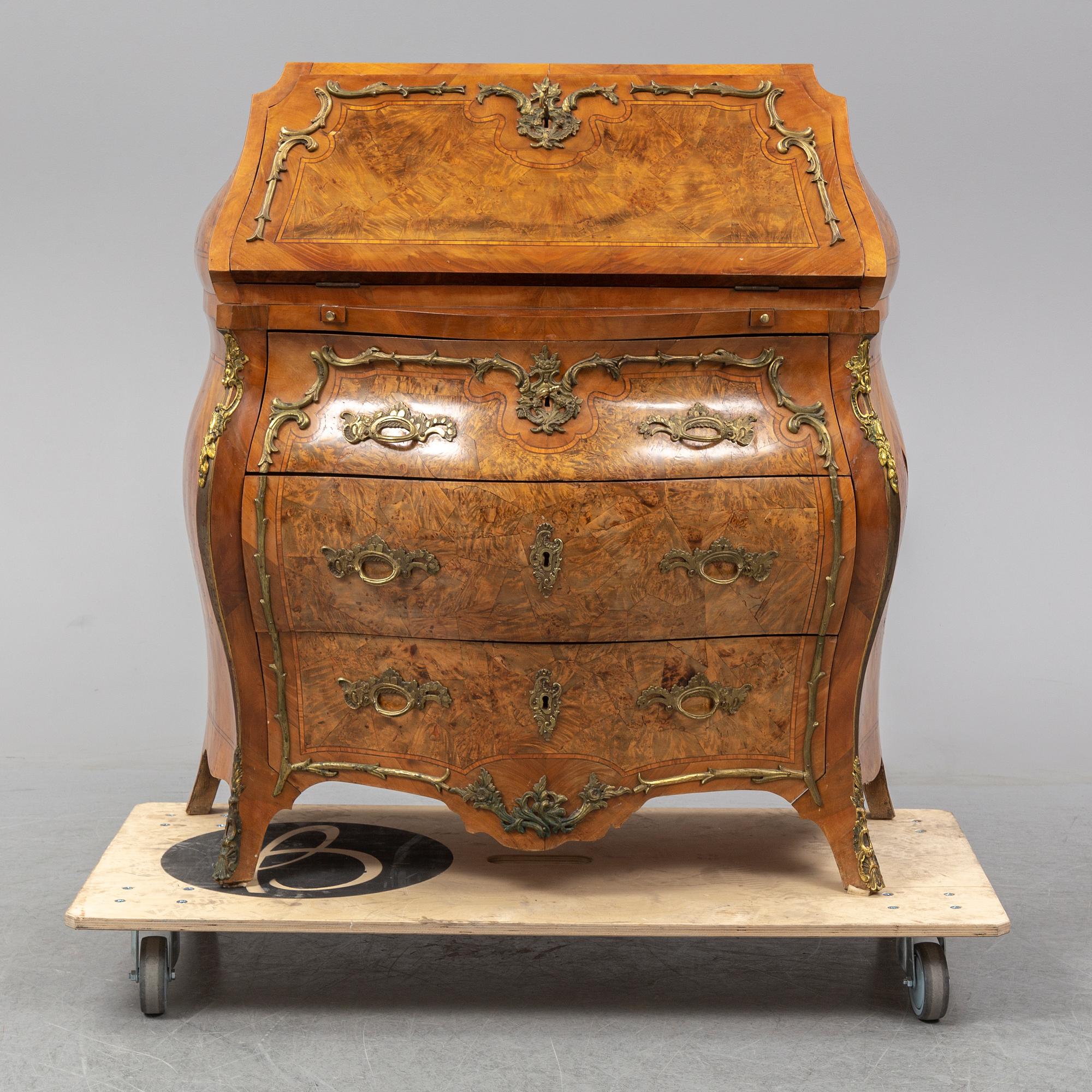 A 19th century rococo style secretaire.