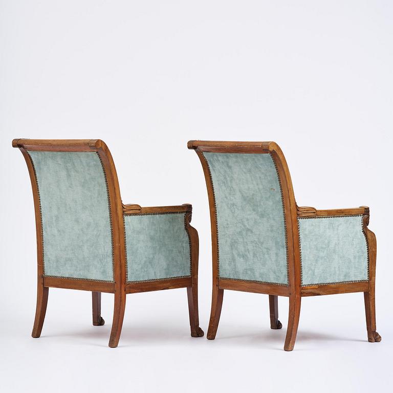 A pair of French Empire mahogny armchairs.