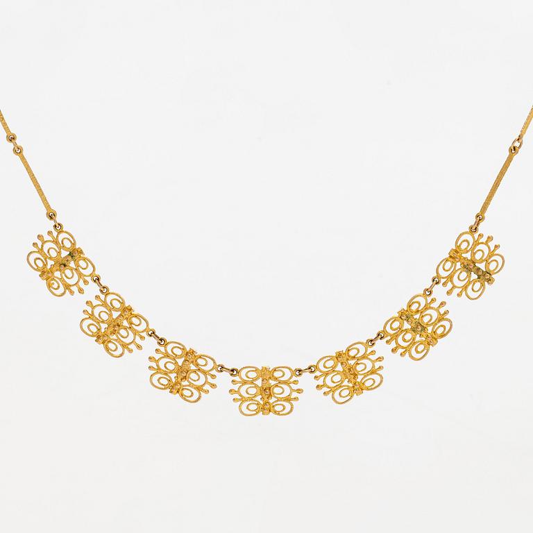 Esko Raitanen, collier, armband och örhängen, 14K guld, Helsingfors 1972.